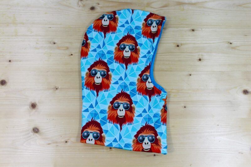 Kapuzen-Buff wendbar "Cool Baboon" türkis-orange
